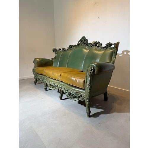A striking and highly decorative Rococo-style sofa produced by the Belgian design brand Sixinch. This sculptural statement...