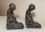 Up for sale is a wonderful pair of antique 19th century figural bronze clad nude cherub bookends. Each is in the form of a...
