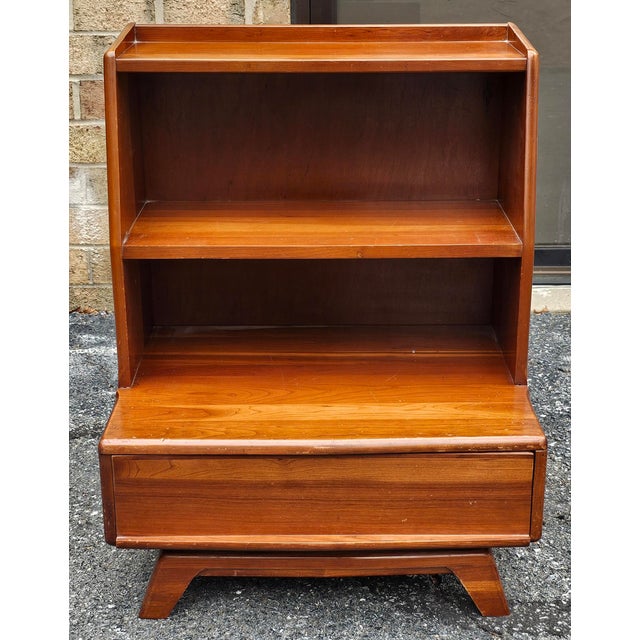 A Kling Furniture Mid Century Solid Cherry Tiered Bedside Table Nightstand. Measures 24" in width, 19" in depth and 30.75"...