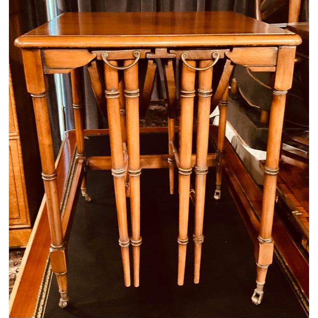 In all my years, which are many, I have never seen nesting tables like this set. Two round nesting tables that apparently...