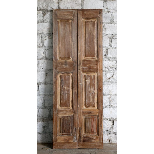 Add timeless character and artisan soul to your kitchen or dining space with these vintage carved double pantry doors,...