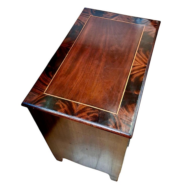 On offer is a beautiful 19th-century Georgian-style mahogany chest of drawers. While it mimics 18th-century Chippendale...