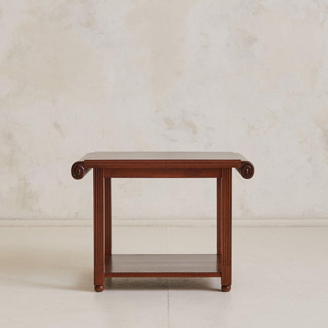 A French side table in richly grained Eastern Rosewood, sourced in the South of France. Dating to the 1940s, the piece...