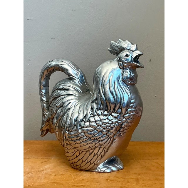 Celebrate the artistry of Arthur Court with this vintage pewter rooster pitcher, a beautifully sculpted piece that...