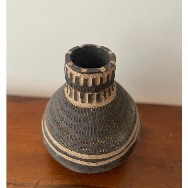 Studio-pottery vase with great patterns. Made in the 1970s. Signed.