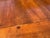 This is a vintage late 20th century French country style dining table. The table features soft curved legs with a...