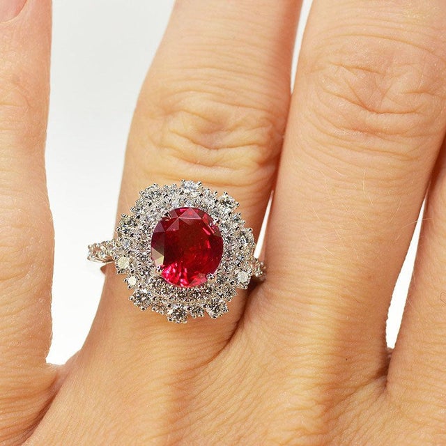 18k White gold ring with AGL certified 3.55 carat no heat ruby and 46 round diamonds weighing weighing 1.26 carats. 6.01...