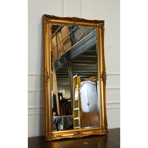 We are delighted to offer for sale This Large French Classic Golden Ornate Wall Mirror. Measures 138 x 77 cm and exudes...