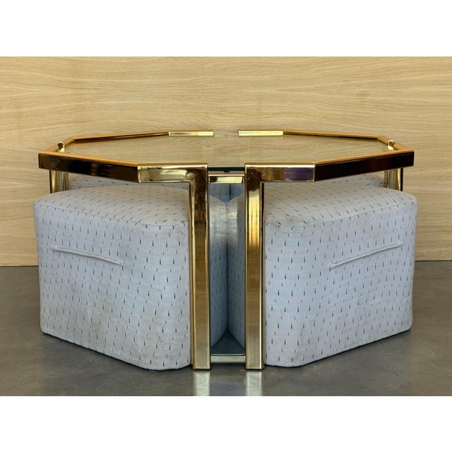 Vintage Hexagonal gilded steel coffee table with four nesting stools. A beautiful low table for living room in a beautiful...