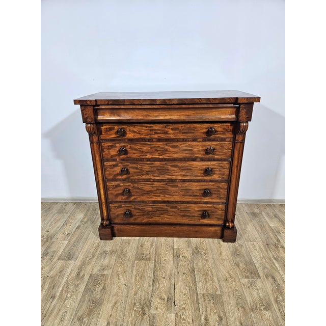 The Biedermeier mahogany chest of drawers comes from the mid-19th century - perfect for your living room! The chest of...
