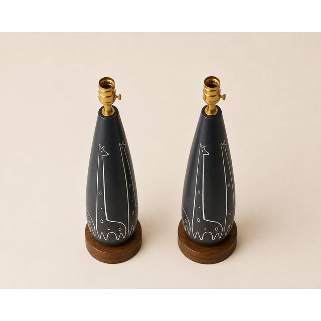 A fantastic and highly collectible pair of vintage Raymor Italian ceramic table lamps, dating to the 1950s–1960s. The...