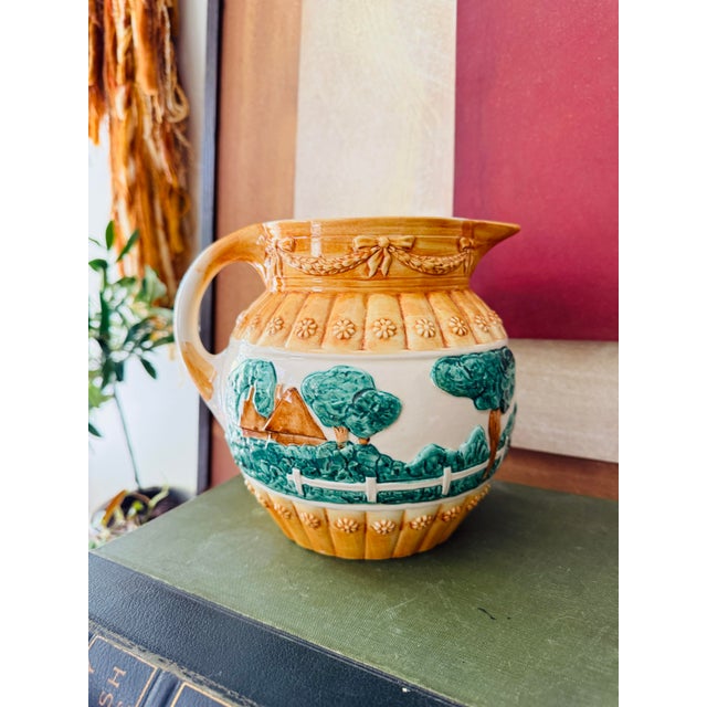 A classic Italian ceramic piece with that rich, old-world charm you can spot from across the room. This sculptural pitcher...