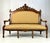 A grand, late 19th-century Italian Renaissance Revival three-piece parlor set, comprising a three-seat settee and two...