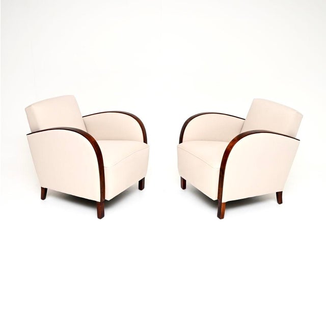 A stylish and very well made pair of Swedish Art Deco armchairs in satin birch. They were recently imported from Sweden,...