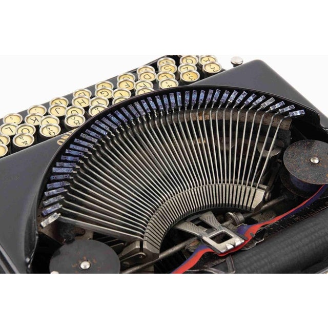 A fine vintage remington portable typewriter, manufactured in the united states and presented in its original fitted...