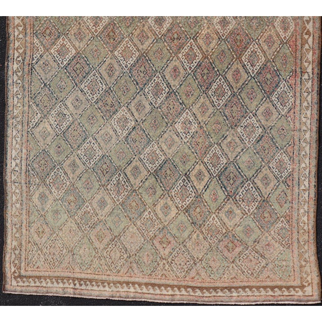 Measures: 5'7 x 9'6 Antique Konya Oushak Rug with Soft Sage, Taupe, Sand, and Muted Rust Tones. Keivan Woven Arts /...