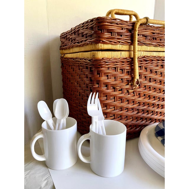 Here is a great picnic basket that comes complete with mugs, plates, flatware and even a blue and white tablecloth! The...