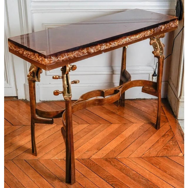 This bronze console table was designed by Enzo Missoni and produced by Franco Gavagni. It features a crushed ice resin...