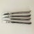 Midcentury rare and high quality , heavy set of 4 stainless steel Dinner Knives, 8.5"L ,makers mark reads " Japan ROGERS...