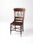 This is an antique pressed back dining chair. The 19th century wooden chair features a "pressed" floral back rail with...