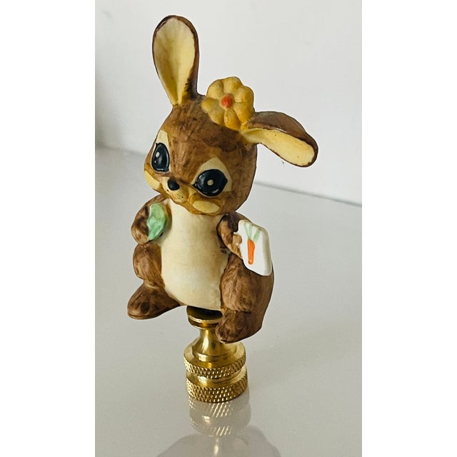 Charming Buny rabbit with carrot porcelain figurine mounted on brass base as lamp finial.