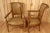 Pretty pair of finely carved walnut armchairs (superb work) from the end of 18th covered with brown skai (comprising wear...
