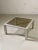 An elegant and rigorous square coffee table, Post-Modernist, Bauhaus, Shabby-Chic, Space-Age, structure in square section...