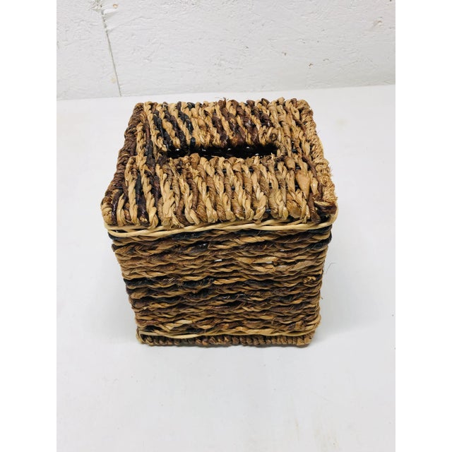 Hide that cardboard tissue box with this seagrass tissue box cover. Measures 6" square.