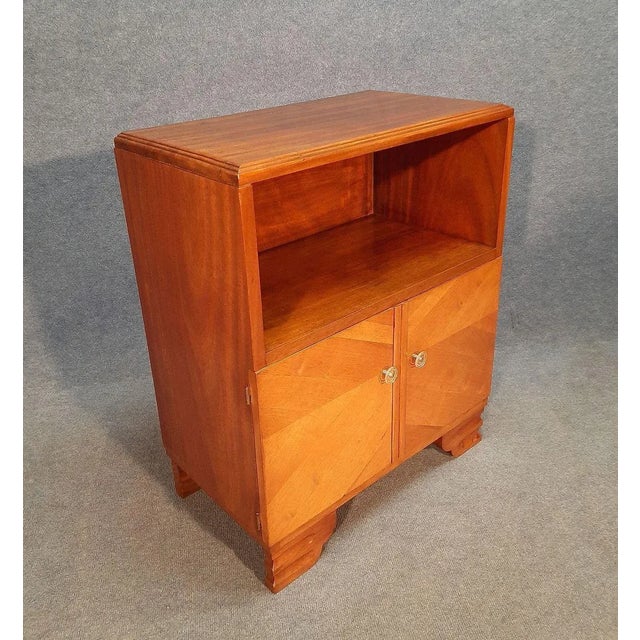 Small furniture in mahogany from the Art Deco period circa 1930. It opens with two doors, an open locker top. Good...