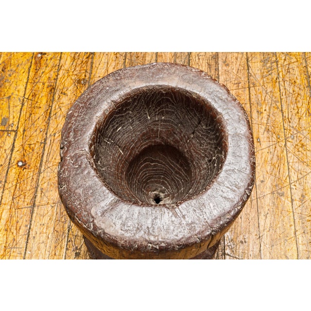 A 19th century rustic teak wood mortar urn, perfect to be used as an antique planter for a vintage home décor. This 19th-...