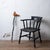 Hand-carved wood cane with a sculptural snake-form shaft and carved hand grip, painted black with white spiral accents and...