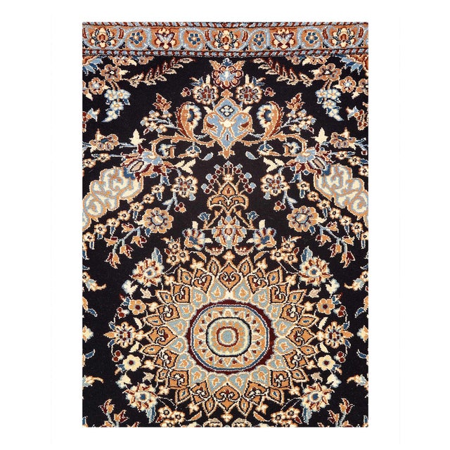 Nain rugs are renowned for their detail and fine use of outlining along the central motifs. Breaking from the classical...