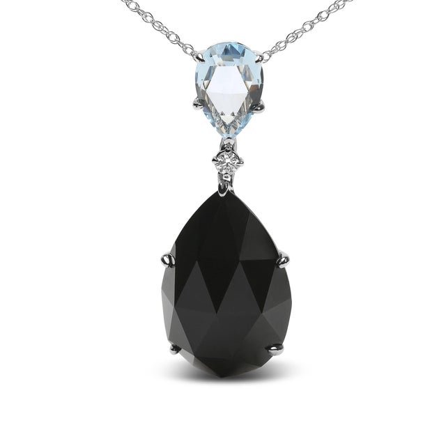 Natural gemstones and elegant aesthetic appeal make this 18k white gold pendant necklace an instant beauty. The...