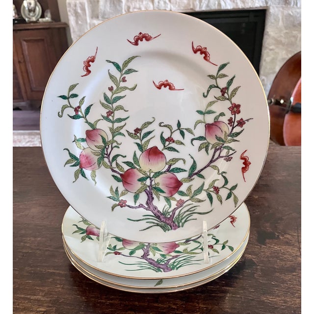 Vintage set of four (4) hand-painted porcelain dinner/charger plates. Featuring the traditional, highly auspicious Chinese...