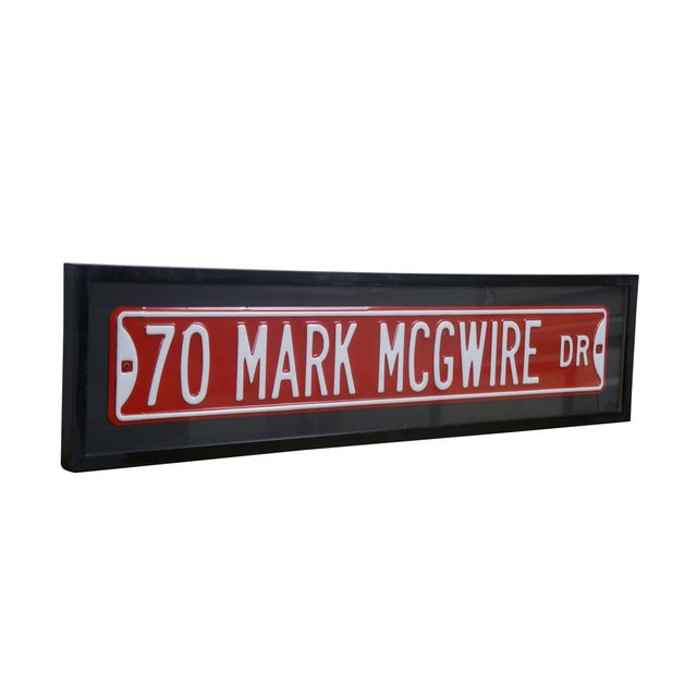 Vintage Mark McGwire commemorative street sign marking his historic 70 home run season. Dimensions: 40" x 1.25" x 10" /...