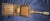 This appears to be an authentic vintage mbuzi (Swahili for "goat"), a traditional folding coconut-grater stool from East...