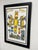 Design Plus Gallery presents a Circa 1986 “Ruckus Taxi” Framed Print by Red Grooms (Born 1937). This colorful composition...
