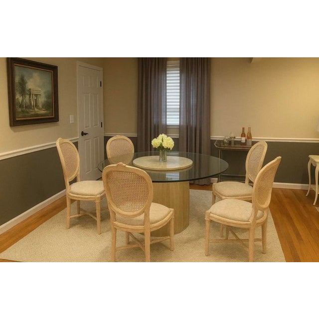 This custom dining table hails from a Montauk, Long Island estate. This faux bois dining table is from the late 20th...