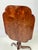 An extraordinary early 19th-century American Federal tilt-top candle stand crafted entirely from highly figured tiger...