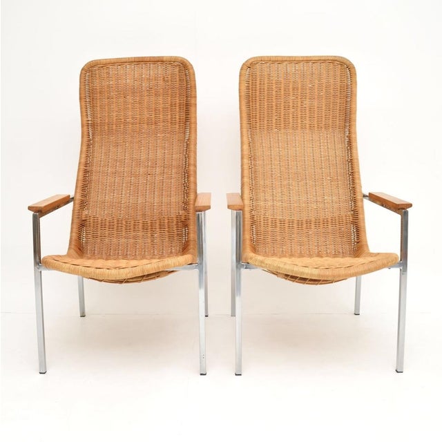 A stunning pair of vintage chrome & Rattan armchairs by Dirk Van Sliedrecht, made in Holland in the 1960’s and made by...