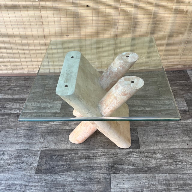 Vintage Post Modern Tessellated Mactan Stone Rounded X-Shape Base Side Table. C 1980s Feature tessellated mactan stone, a...
