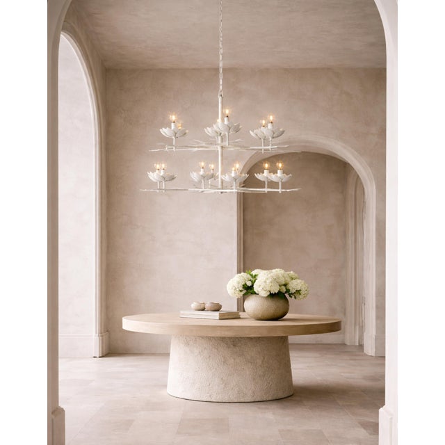 A striking and sculptural “Clementine” tiered chandelier designed by Julie Neill for Visual Comfort, celebrated for its...