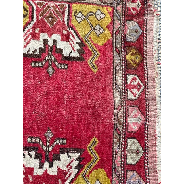 Beautiful mid century Turkish yastik rug with nice geometrical design and beautiful colours, entirely hand knotted with...