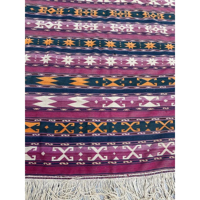 Beautiful early 20th century tribal Kilim with geometrical design and nice colors, entirely hand woven with wool on wool...