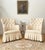 Newly upholstered in a textured weave sateen fabric, this pair of elegant Edwardian button back chairs, have a pleated...
