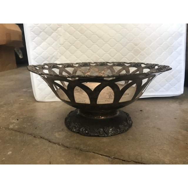 Attractive vintage pierced footed bowl, appears to be silver plated , see marking in last photo. Tarnished, with great...