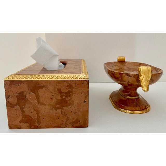 Elegant and timeless Neoclassical style bathroom set. Made of brown marble with a beautiful grain and gold metal details....