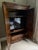 Gorgeous in prime condition. Interior has large drawer at bottom, 2 adjustable shelves and hanging rod