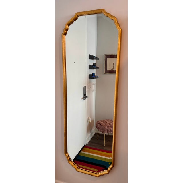 Uttermost Scalloped Gold Wall Mirror — 21.5" x 61.5" The last check before leaving the apartment. Even guests appreciated...
