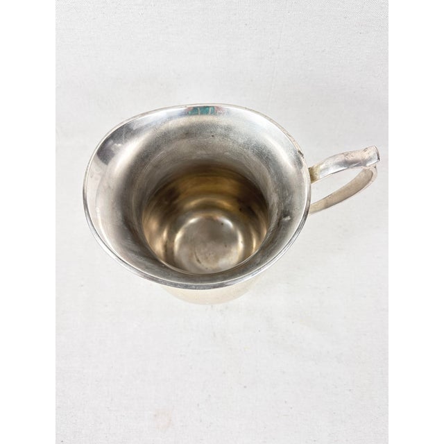 Lovely Pottery Barn hotel collection pitcher. Made of metal and features the word “Drink”. Wonderful rustic/worn quality...